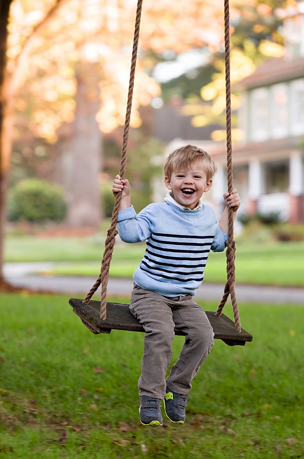 child-portrait-photographer-charlotte.jpg charlotte child portrait photographer boy in swing