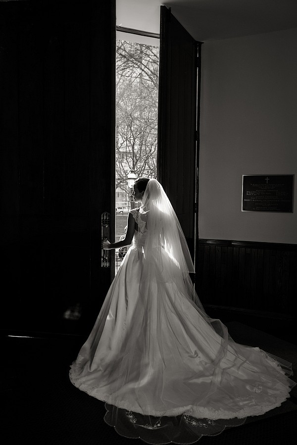 first-presbyterian-uptown-charlotte-bride.jpg Bride posing in doorway at First Presbyterian Charlotte NC